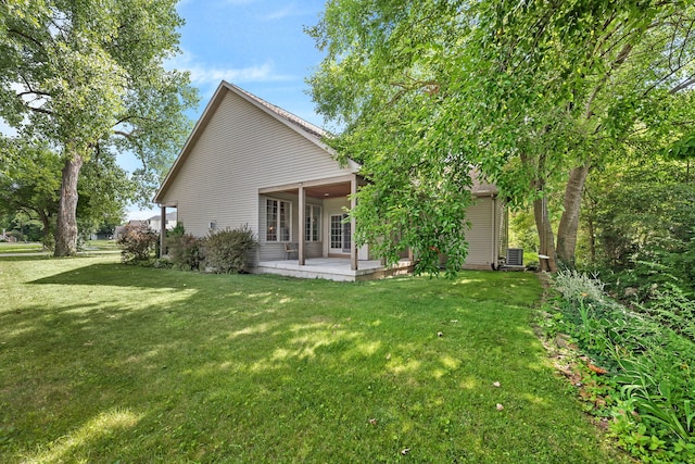 300 Village Ln, Seneca, IL 61360 - rear view of property featuring a yard and a patio area