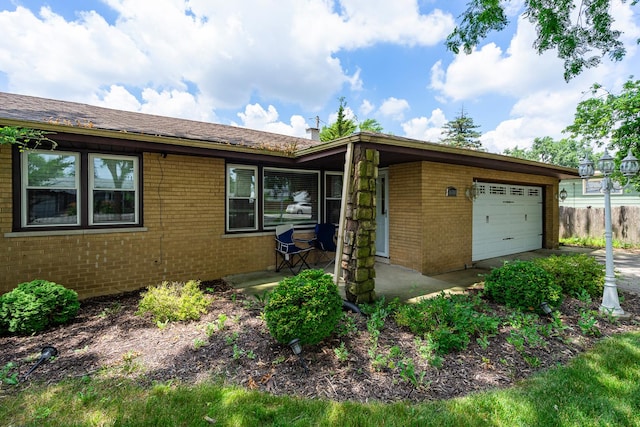 16000 Long Ave, Oak Forest, IL 60452 - view of front of house with brick siding and an attached garage