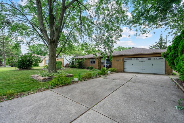 16000 Long Ave, Oak Forest, IL 60452 - ranch-style house featuring brick siding, concrete driveway, a front lawn, and an attached garage