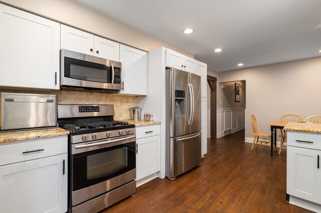16000 Long Ave, Oak Forest, IL 60452 - kitchen with stainless steel appliances, recessed lighting, white cabinetry, decorative backsplash, and wainscoting