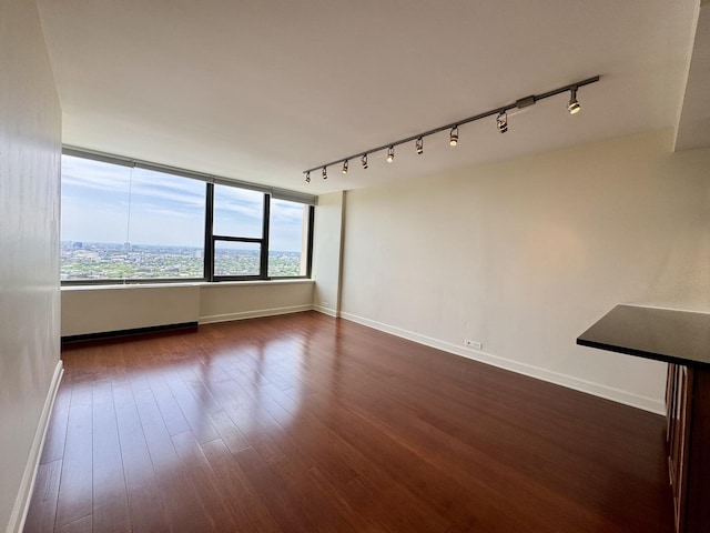 1850 N Clark St Unit 2706, Chicago, IL 60614 - unfurnished room with track lighting and dark wood finished floors