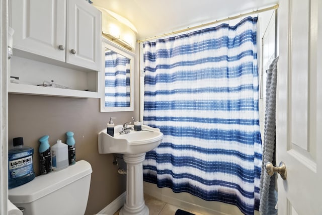 2730 N 74th Ct Unit Gw, Elmwood Park, IL 60707 - full bath featuring shower / bathtub combination with curtain and tile patterned floors