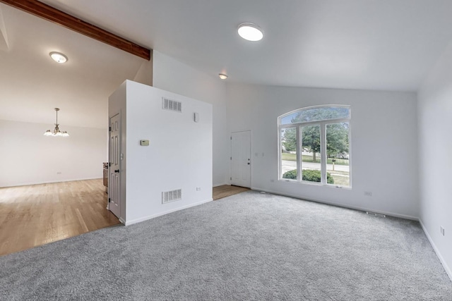 25651 S Middle Point Ave, Monee, IL 60449 - unfurnished room featuring carpet flooring, a chandelier, beam ceiling, and high vaulted ceiling