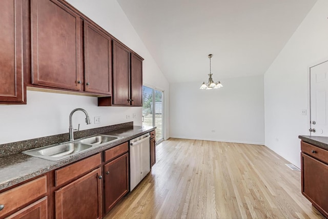 25651 S Middle Point Ave, Monee, IL 60449 - kitchen featuring light wood finished floors, stainless steel dishwasher, a chandelier, vaulted ceiling, and decorative light fixtures