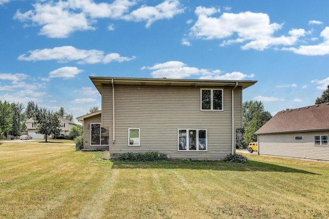 25651 S Middle Point Ave, Monee, IL 60449 - rear view of house with a yard
