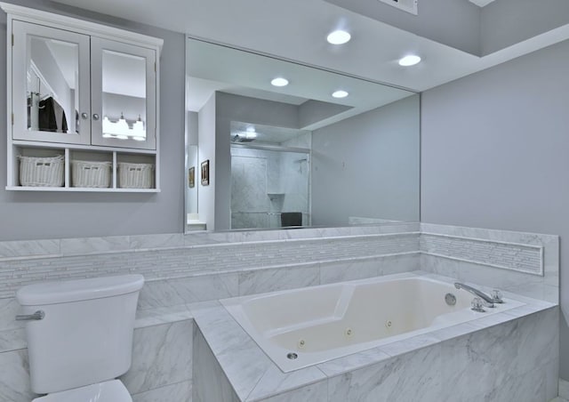 14031 Norwich Ln Unit 101, Orland Park, IL 60467 - bathroom with a tub with jets, a shower stall, and recessed lighting