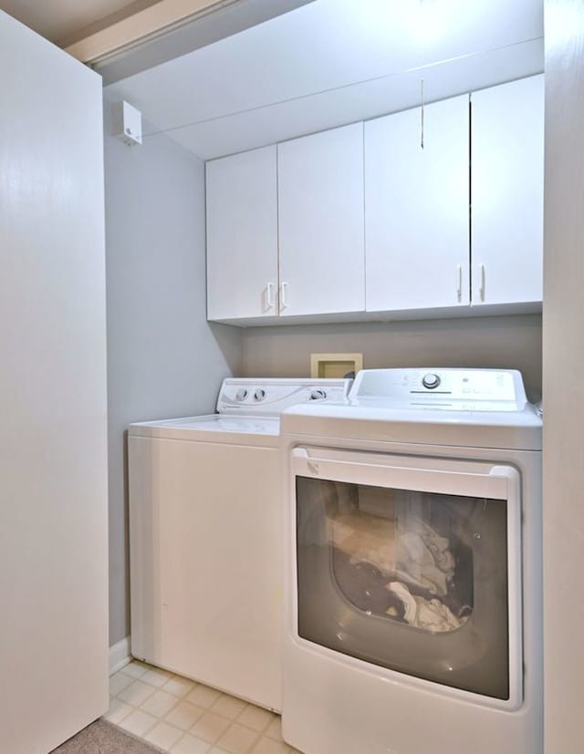 14031 Norwich Ln Unit 101, Orland Park, IL 60467 - laundry room with washer and dryer and cabinet space