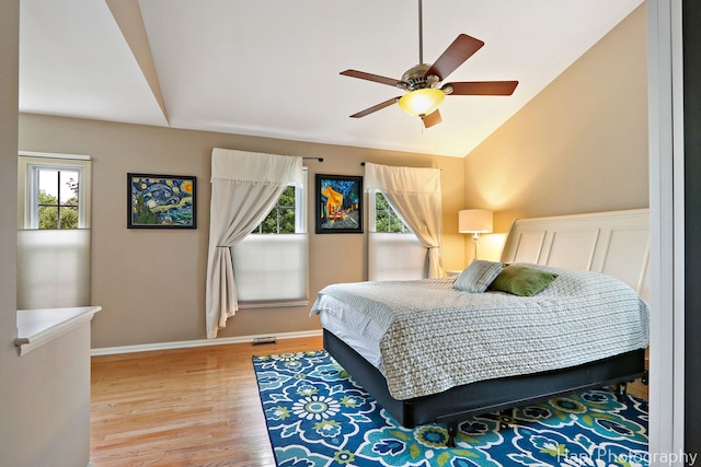 768 Wexford Ct, Grayslake, IL 60030 - bedroom with light wood-style floors, lofted ceiling, and a ceiling fan