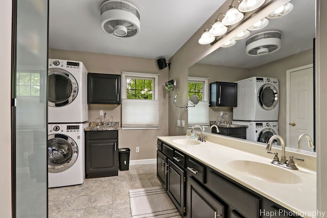 768 Wexford Ct, Grayslake, IL 60030 - laundry room featuring stacked washing machine and dryer and a sink