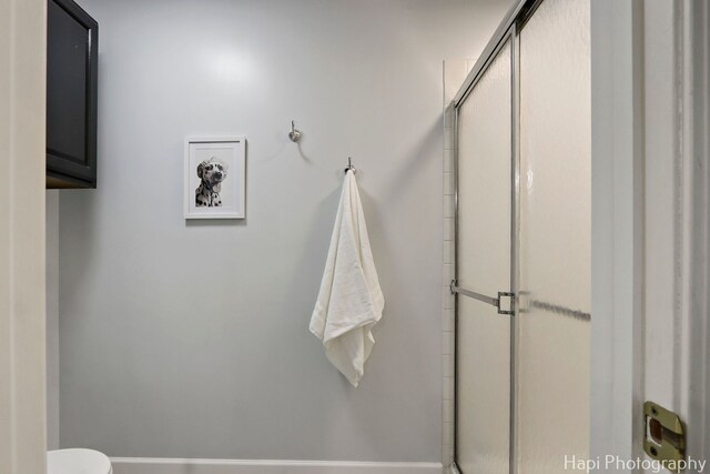 768 Wexford Ct, Grayslake, IL 60030 - bathroom featuring a shower stall and toilet
