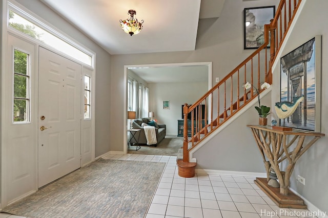 768 Wexford Ct, Grayslake, IL 60030 - entryway with tile patterned flooring and stairway