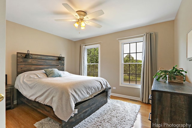 768 Wexford Ct, Grayslake, IL 60030 - bedroom with light wood-type flooring and a ceiling fan