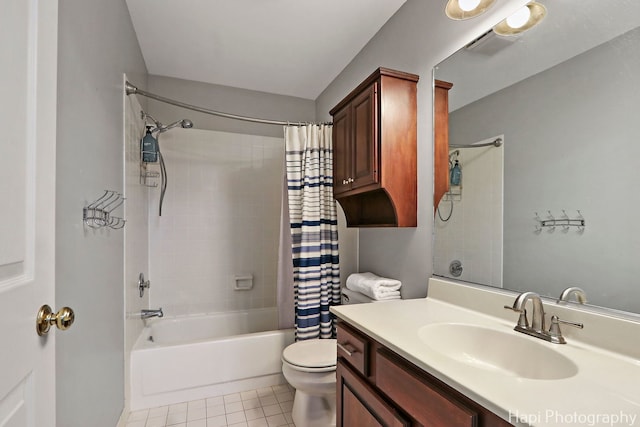 768 Wexford Ct, Grayslake, IL 60030 - bathroom featuring shower / bath combo with shower curtain, vanity, and tile patterned floors