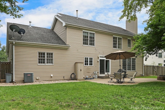 768 Wexford Ct, Grayslake, IL 60030 - rear view of property with a patio area, a chimney, and a shingled roof