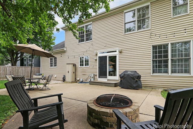 768 Wexford Ct, Grayslake, IL 60030 - back of property featuring an outdoor fire pit, a patio area, and outdoor dining area