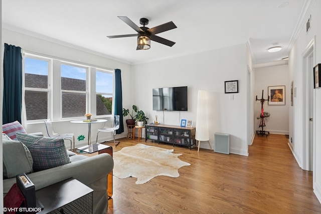 3555 W Lyndale St Unit 3B, Chicago, IL 60647 - living area with ornamental molding, ceiling fan, and wood finished floors