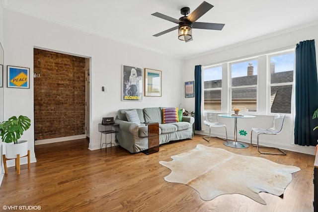 3555 W Lyndale St Unit 3B, Chicago, IL 60647 - living room with crown molding, ceiling fan, wood finished floors, and brick wall