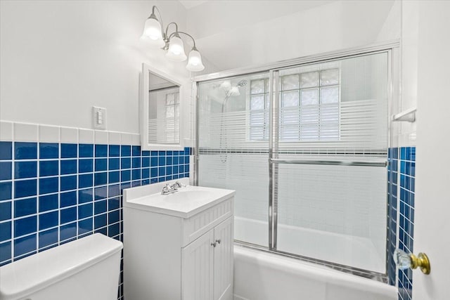 115 S Hale St, Palatine, IL 60067 - bathroom featuring enclosed tub / shower combo, vanity, tile walls, and wainscoting