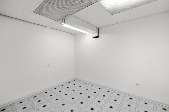 115 S Hale St, Palatine, IL 60067 - spare room with tile patterned floors and a paneled ceiling