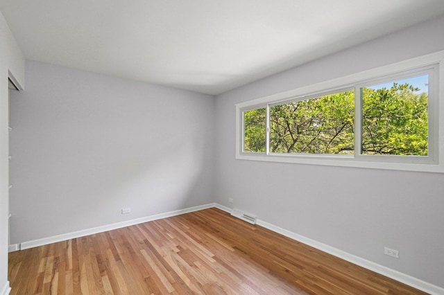 129 Kainer Ave, Barrington, IL 60010 - unfurnished bedroom with baseboards and light wood finished floors