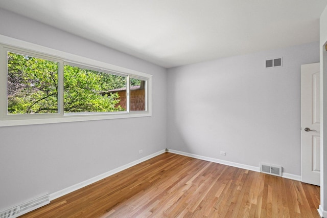 129 Kainer Ave, Barrington, IL 60010 - spare room featuring baseboards and light wood finished floors