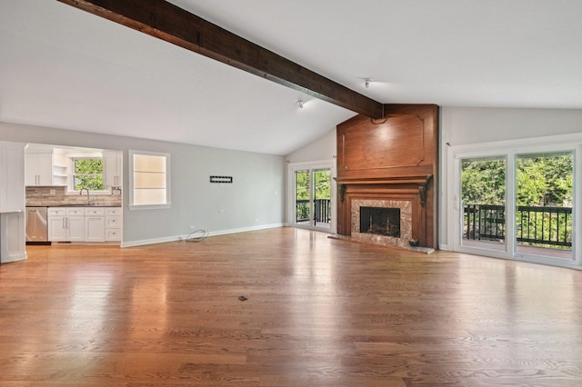 129 Kainer Ave, Barrington, IL 60010 - unfurnished living room featuring light wood finished floors and a fireplace