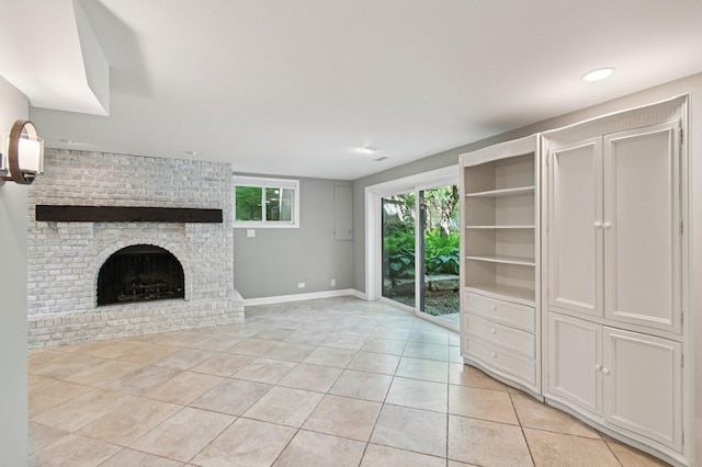 129 Kainer Ave, Barrington, IL 60010 - unfurnished living room with light tile patterned floors and a brick fireplace