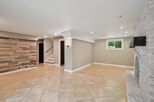 129 Kainer Ave, Barrington, IL 60010 - basement with recessed lighting, light tile patterned floors, stairway, and a brick fireplace