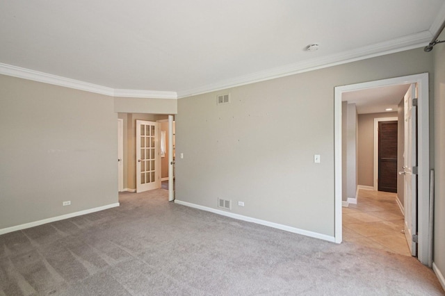 129 Kainer Ave, Barrington, IL 60010 - unfurnished room with ornamental molding, light colored carpet, french doors, and a smoke detector