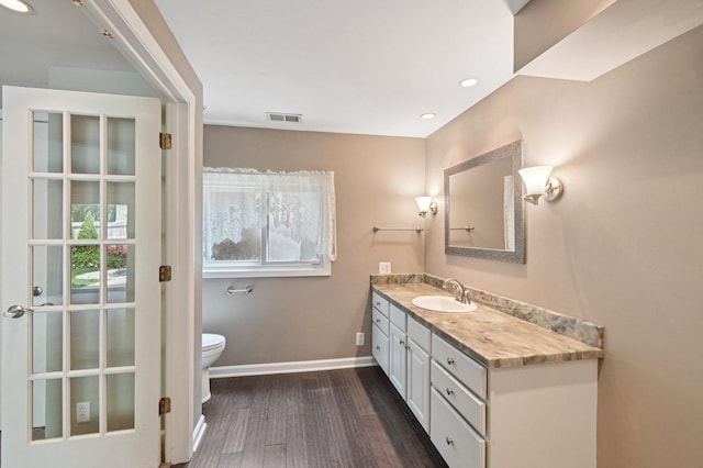 129 Kainer Ave, Barrington, IL 60010 - bathroom with vanity, wood finished floors, and recessed lighting