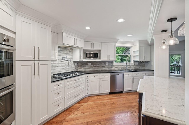 129 Kainer Ave, Barrington, IL 60010 - kitchen with appliances with stainless steel finishes, ornamental molding, white cabinetry, tasteful backsplash, and open shelves