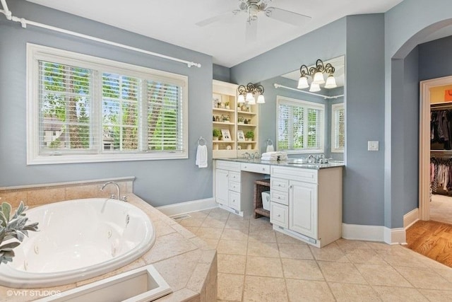 41W590 Bowgren Dr, Campton Hills, IL 60119 - full bath with vanity, a jetted tub, a ceiling fan, and a spacious closet