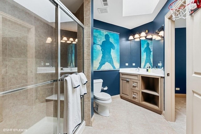 41W590 Bowgren Dr, Campton Hills, IL 60119 - bathroom featuring vanity, a shower stall, a skylight, and tile patterned flooring