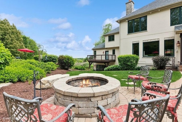 41W590 Bowgren Dr, Campton Hills, IL 60119 - view of patio / terrace with an outdoor fire pit