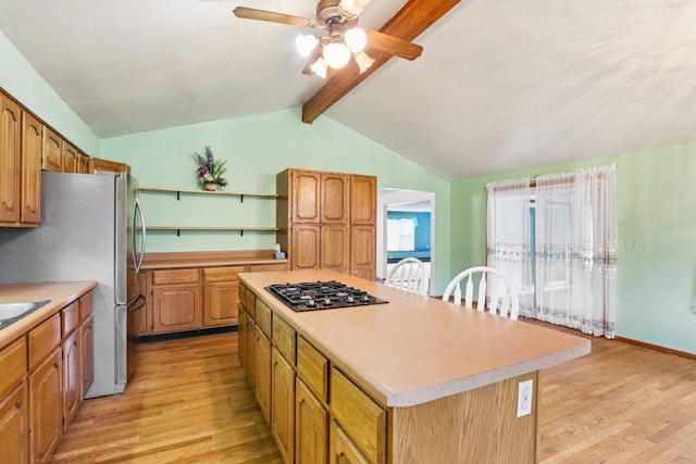 602 Daisy Ln, Round Lake Beach, IL 60073 - kitchen featuring light wood finished floors, gas stovetop, open shelves, and a ceiling fan
