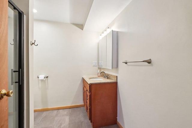 602 Daisy Ln, Round Lake Beach, IL 60073 - bathroom featuring vanity and baseboards