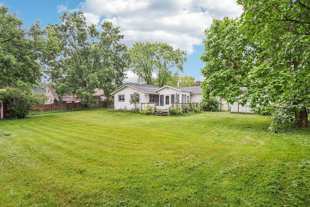 602 Daisy Ln, Round Lake Beach, IL 60073 - view of yard with a deck