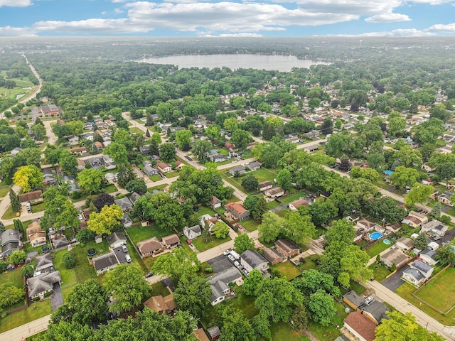 602 Daisy Ln, Round Lake Beach, IL 60073 - aerial perspective of suburban area featuring a large body of water and a forest