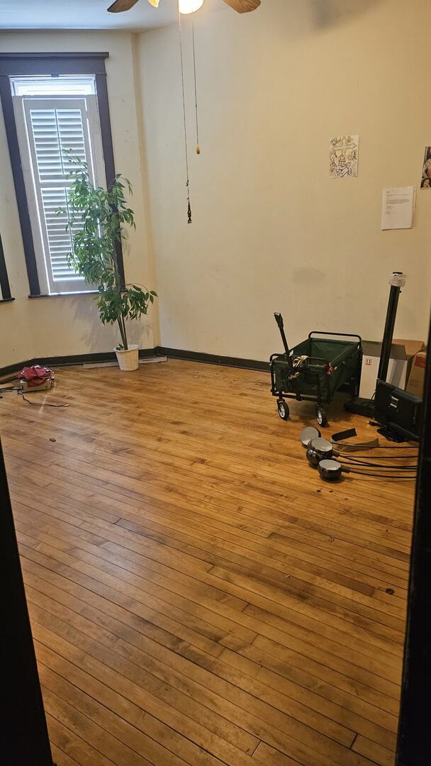 2536 S Avers Ave, Chicago, IL 60623 - workout room with hardwood / wood-style flooring and ceiling fan