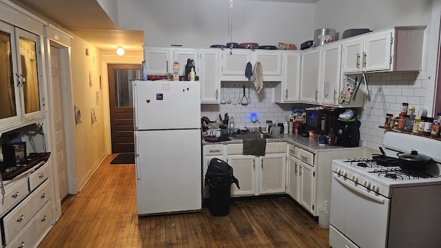 2536 S Avers Ave, Chicago, IL 60623 - kitchen with white appliances, tasteful backsplash, white cabinets, and wood-type flooring