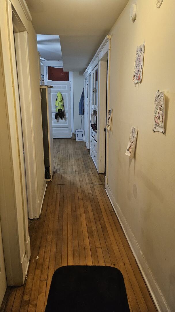 2536 S Avers Ave, Chicago, IL 60623 - hallway with dark wood-style floors