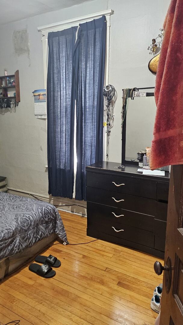 2536 S Avers Ave, Chicago, IL 60623 - bedroom featuring wood-type flooring