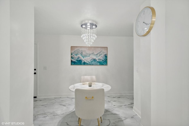 5950 N Kenmore Ave Unit 306, Chicago, IL 60660 - bathroom with marble finish flooring and a chandelier