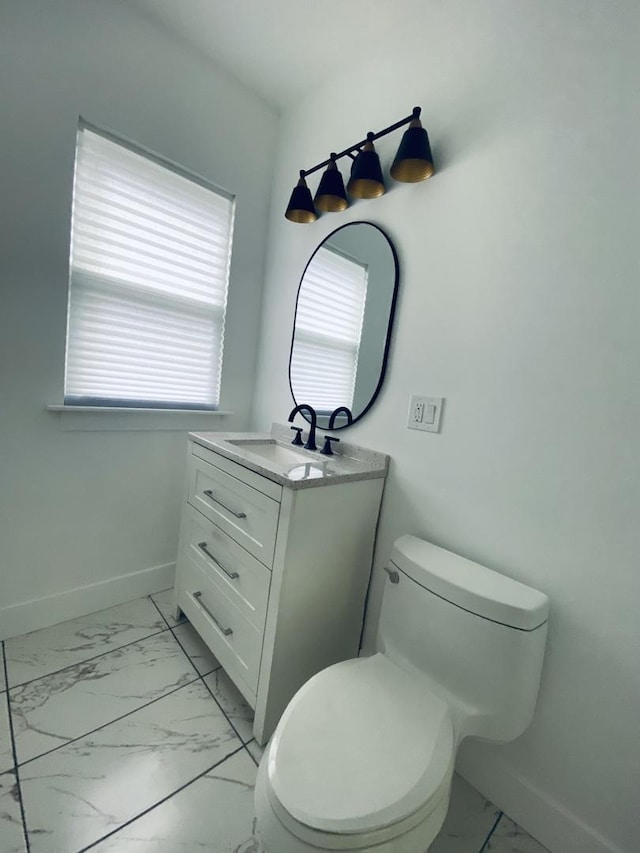 411 W 116th St, Chicago, IL 60628 - bathroom with marble look tile flooring and vanity