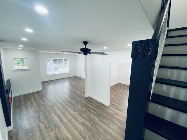 411 W 116th St, Chicago, IL 60628 - unfurnished living room with a ceiling fan, recessed lighting, wood finished floors, and stairway