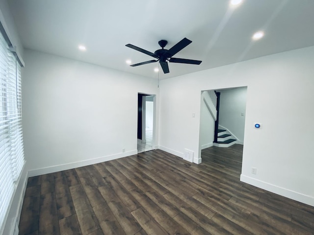 411 W 116th St, Chicago, IL 60628 - spare room with recessed lighting, dark wood finished floors, a ceiling fan, and stairs