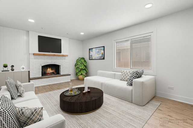 154 Newton Ave, Glen Ellyn, IL 60137 - living area with wood finished floors, a brick fireplace, and recessed lighting
