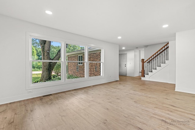 154 Newton Ave, Glen Ellyn, IL 60137 - unfurnished living room featuring stairs, recessed lighting, and light wood finished floors