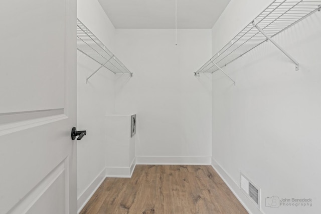 154 Newton Ave, Glen Ellyn, IL 60137 - walk in closet featuring wood finished floors