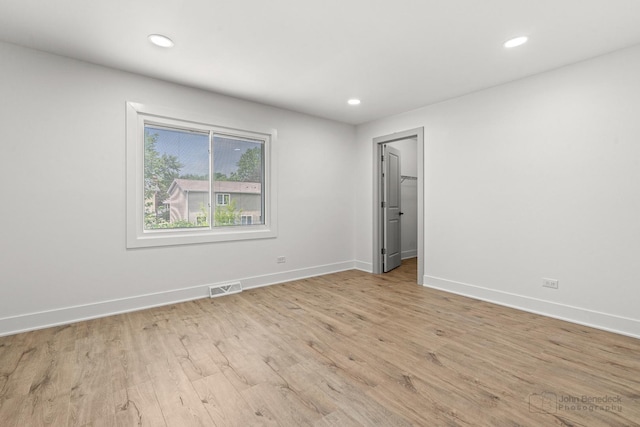 154 Newton Ave, Glen Ellyn, IL 60137 - empty room with light wood-style flooring and recessed lighting